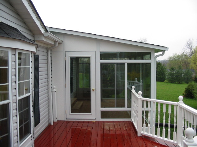 White interior and exterior with Swing Door, glass transoms & kickpanels