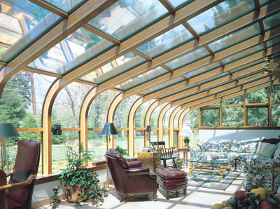 Curved Eave Glass Roof Design Bronze exterior Northern white pine interior with awning windows
